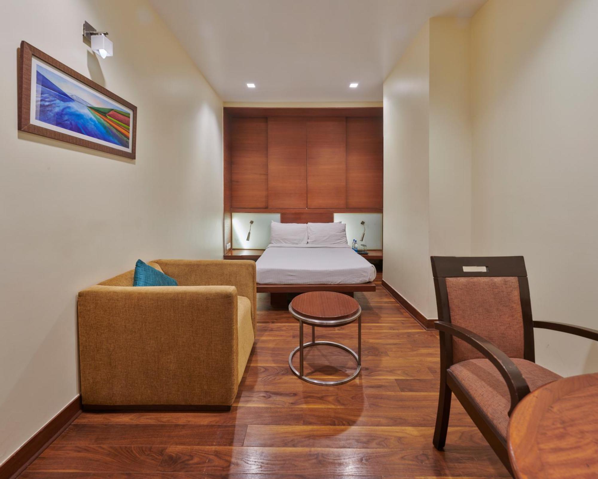 Hotel Studio Estique Pune Habitación foto