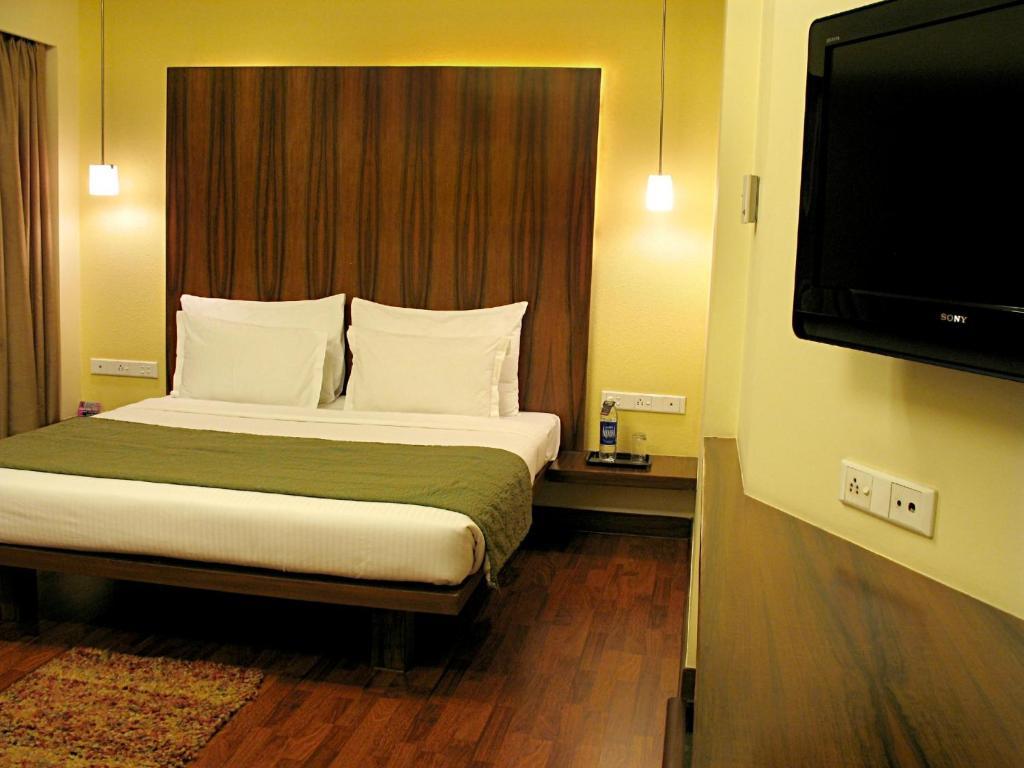 Hotel Studio Estique Pune Habitación foto