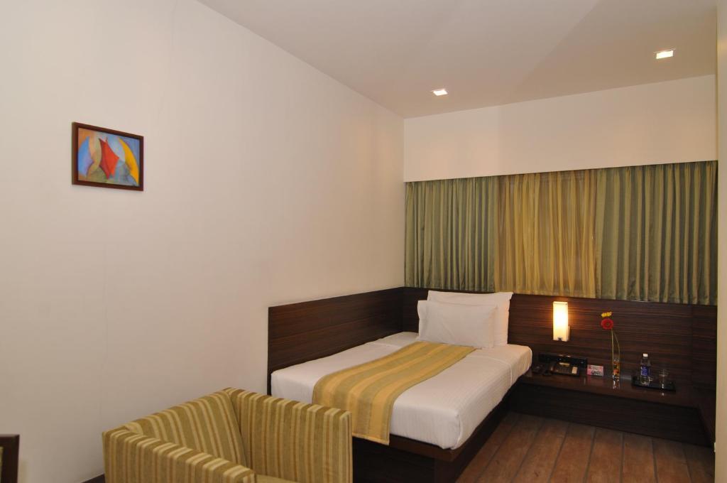 Hotel Studio Estique Pune Habitación foto