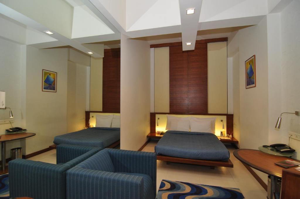 Hotel Studio Estique Pune Habitación foto